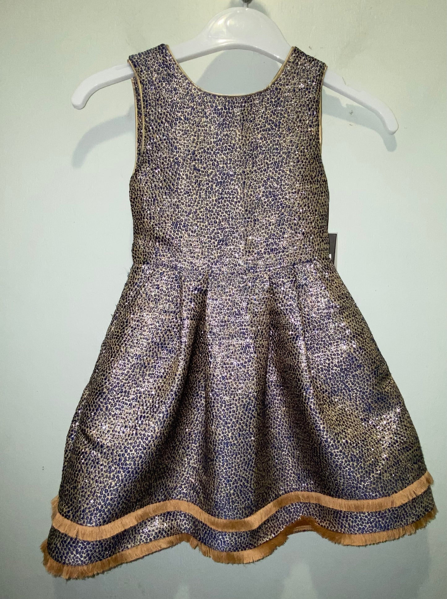 Metallic Jumper With Fringe Edge