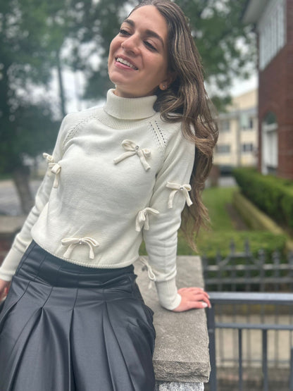 KNIT TOP WITH BOWS