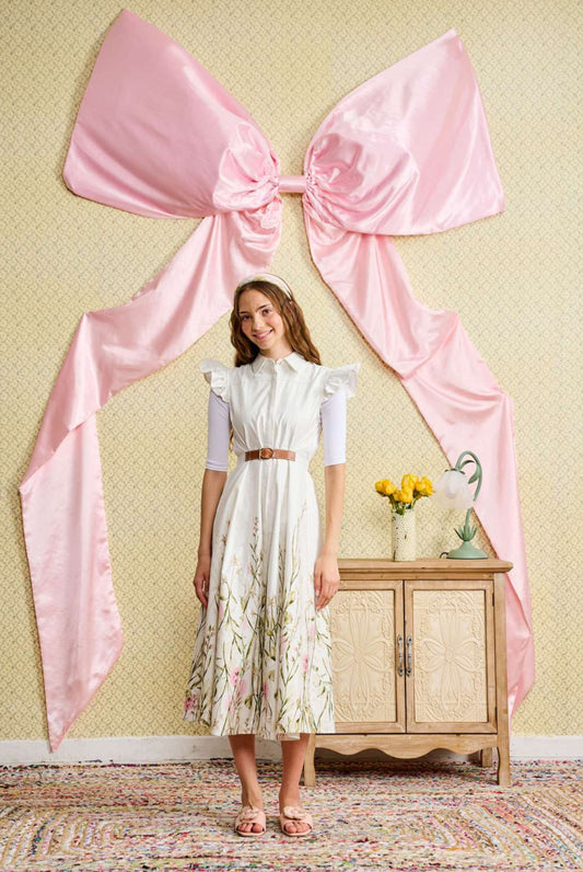 BUTTON DOWN JUMPER WITH A FLORAL BORDER