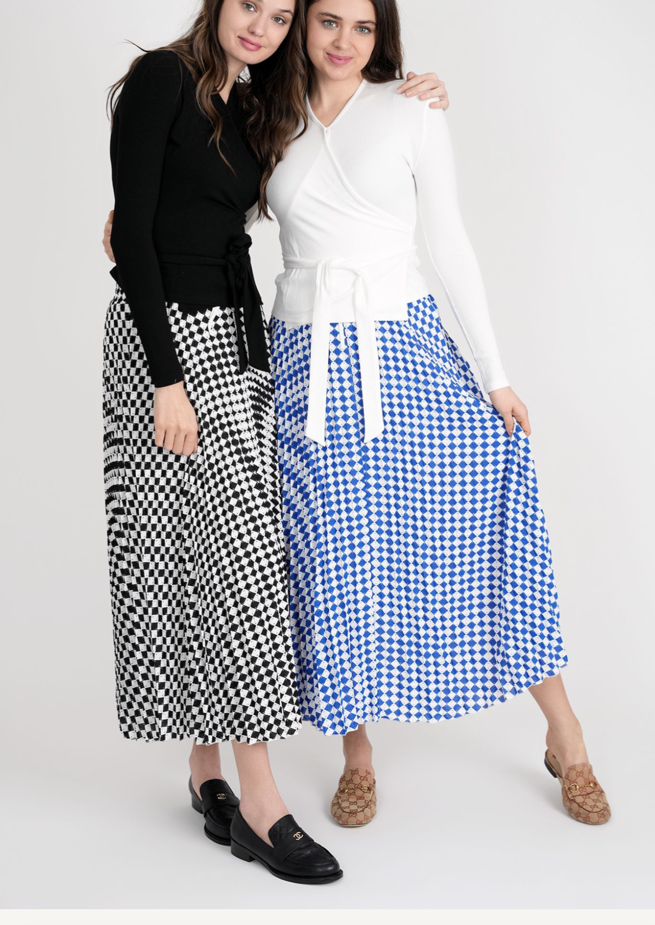 MIDI PLEATED HOUNDSTOOTH SKIRT