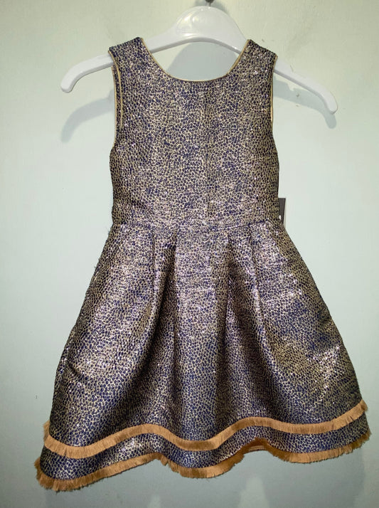 Metallic Jumper With Fringe Edge