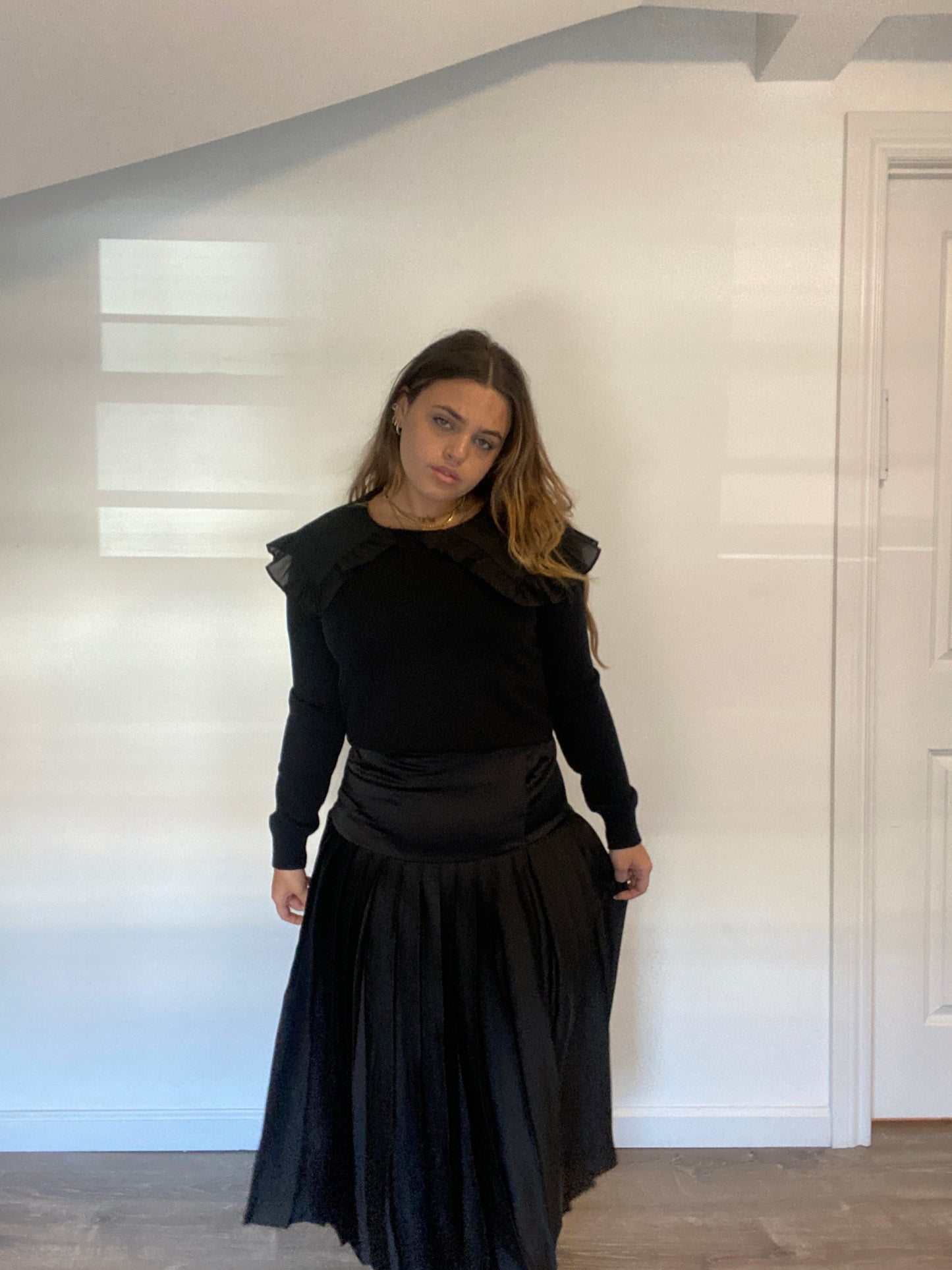 PLEATED BLACK SATIN SKIRT