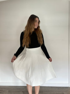 PLEATED KNIT SKIRT